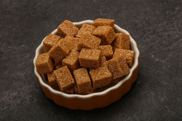 Cane sugar cubs in the bowl