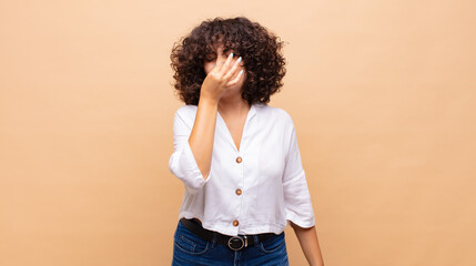  feeling disgusted, holding nose to avoid smelling a foul and unpleasant stench