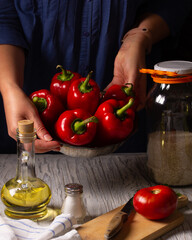 Cooking process of bell red pepper stuffed with rice and carrots