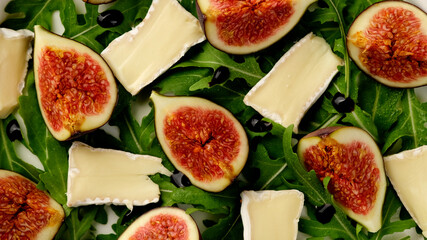 Very delicious salad figs, camembert, arugula rotating. Healthy food
