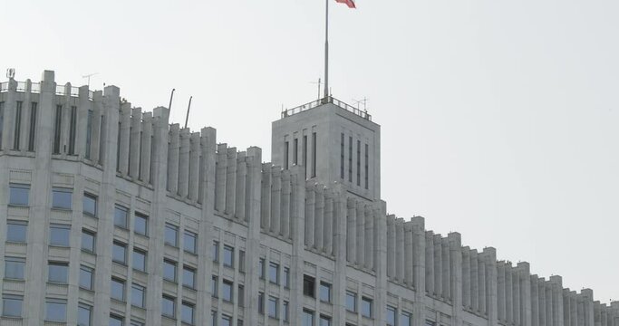 House of the Government of Russian Federation (White House), Moscow, Russia. Beautiful view of the Russian Government House with russian flag. State building in the city center in summer.