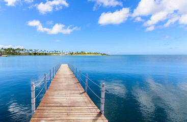 Fototapeta premium wooden bridge juts out into of the sea