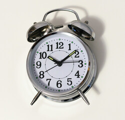 Closeup of an alarm clock isolated on a white background