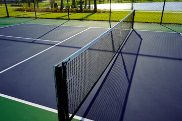 Close up of a Pickleball Court and Net.   