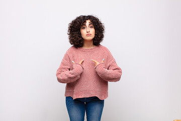  pointing to self with a confused and quizzical look, shocked and surprised to be chosen