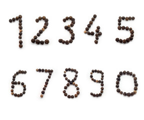 Black pepper number background, herbs, spices in top view.