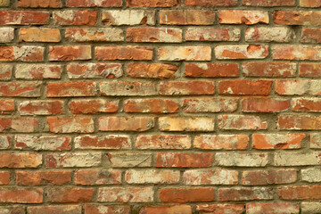 Grunge red brick wall background horizontal. Old brick wall or fence.