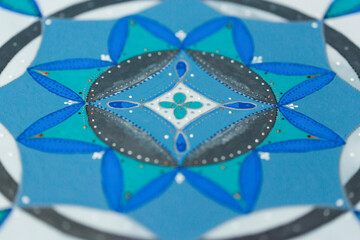 Fragment of decorative plate or platter, painted with blue, violet, grey and green acrylic paint