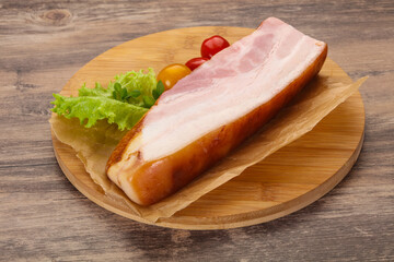 Smoked pork breast with salad leaves