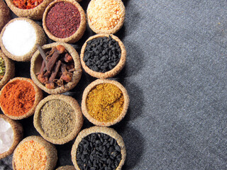  spices background, top view. glasses of spices.    