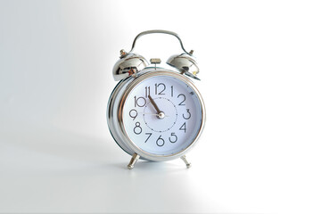 old alarm clock on white background.copy spase
