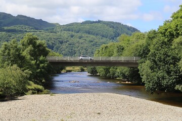 Fototapeta premium A modern bridge over the Mawddach River at Llanelltyd, Gwynedd, Wales, UK.