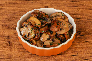 Roasted champignon with herbs and spices