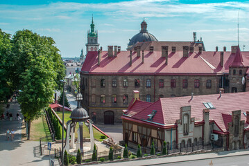 Fototapeta na wymiar Summer Lviv cityscape and Fire station old building in Ukraine