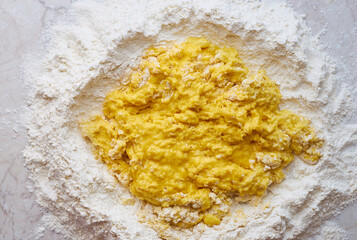 Cooking pizza dough from flour and eggs