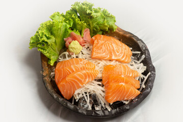sliced raw fresh salmon serve on ice