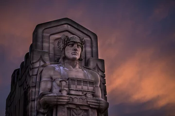 Fotobehang Guardian of Traffic in cleveland ohio with a fiery sunset © Alex
