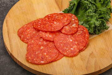 Italian spycy pepperoni sausage slices