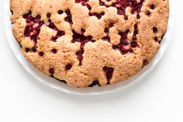 Piece of pie with berries top view, flat. Red currant sponge cake