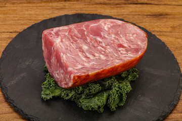 Beef ham piece over board