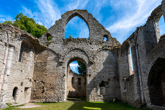 Summer, inside interior architecture of an ancient medieval church ruin with blue sky in Visby Gotland Sweden. Historical ruins with free entry.