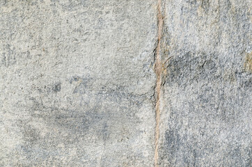Granite slab, with gray shades, which create chromatisms of the various mineral crystals, these stones decorate buildings in many cities. Granite is mainly composed of quartz.