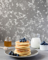 homemade pancakes with fresh blueberries and delicious milk