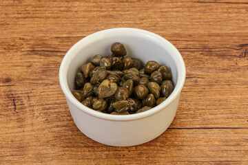 Tasty capers in the bowl