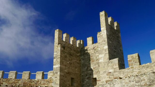 Stone fortress on a background of blue clear sky in the Crimea. 4K