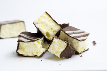 Dark chocolate covered spongy banana cream