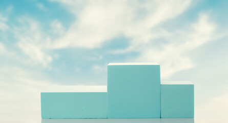 Blue podium against the sky