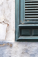 Colored Yellow Facade With Wooden Green Window