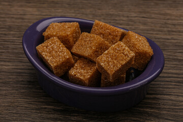 Cane sugar cubs in the bowl