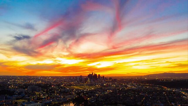 Aerial hyperlapse parallax shot of sunset afterglow over downtown Los Angeles in California
