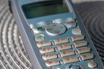 close up of mobile phone on table