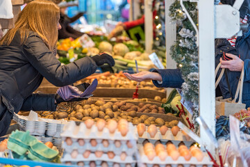 market scene handing over money paying