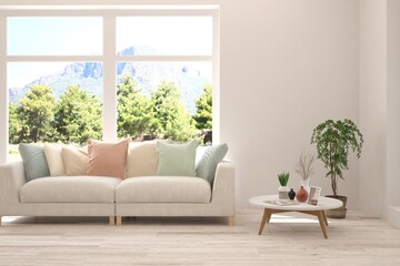 White living room with sofa and summer landscape in window. Scandinavian interior design. 3D illustration