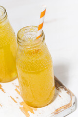 homemade citrus lemonade on a white background, top view closeup