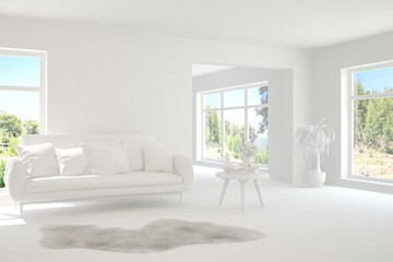Obraz na płótnie Canvas White living room with sofa and summer landscape in window. Scandinavian interior design. 3D illustration