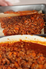 Leveling meat sauce. Making Lasagna Bolognese Series.