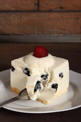 Frozen cheesecake with blueberry and raspberry