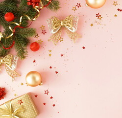 Christmas background . Xmas or new year decorations on pink background with empty copy space for text. holiday concept for postcard or invitation. top view.