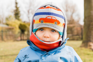 Winter portrait of toddler girl outdoors