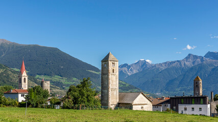 Beautiful panoramic view of the old town of Malles Venosta, against the Alps, South Tyrol, Italy