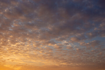 Naklejka na ściany i meble sunset with fluffy clouds