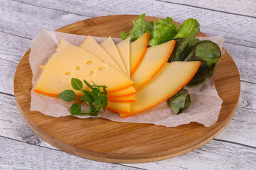 Sliced yellow Swiss cheese