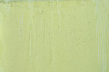 Abstract background from a concrete wall painted in pastel colors.