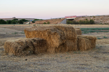 a field with straw bales in Castilla la Mancha. Spain