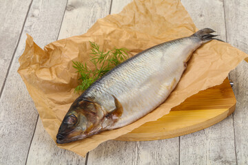 Salted herring over the wooden board