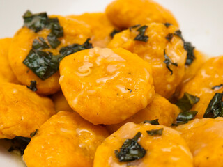 Carrot gnocchi with butter and sage